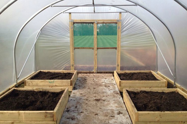 Greenhouse with fresh soil
