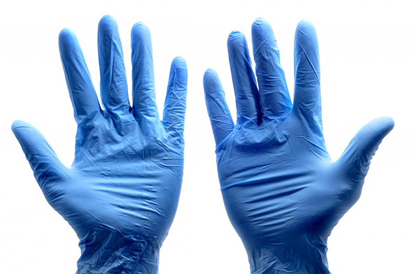 Hands in protective gloves